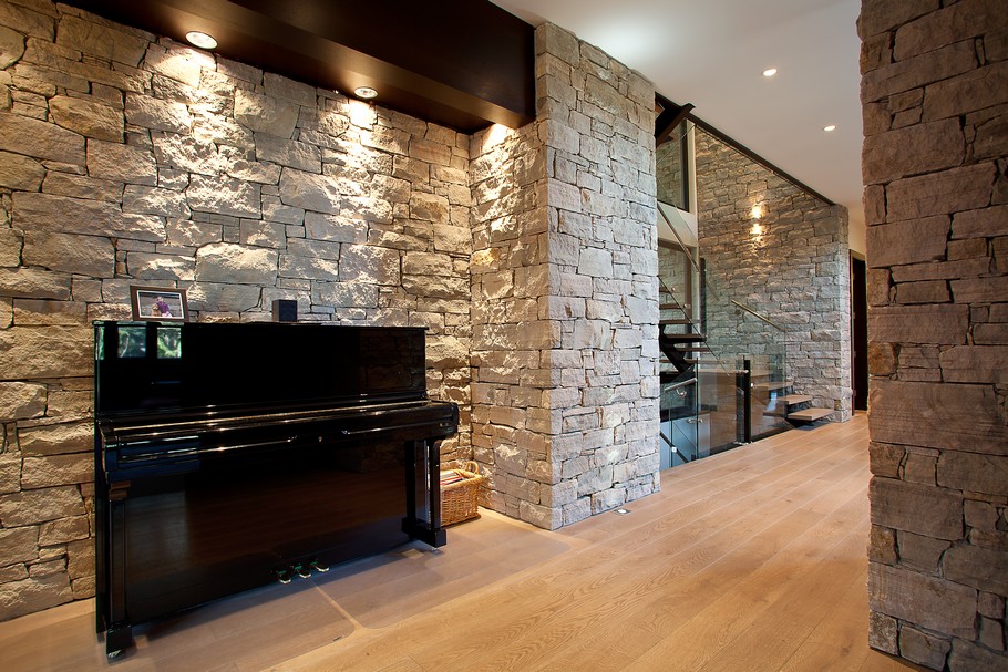 Alleyway with Stone Wall and Hardwood Floor near the Staircase