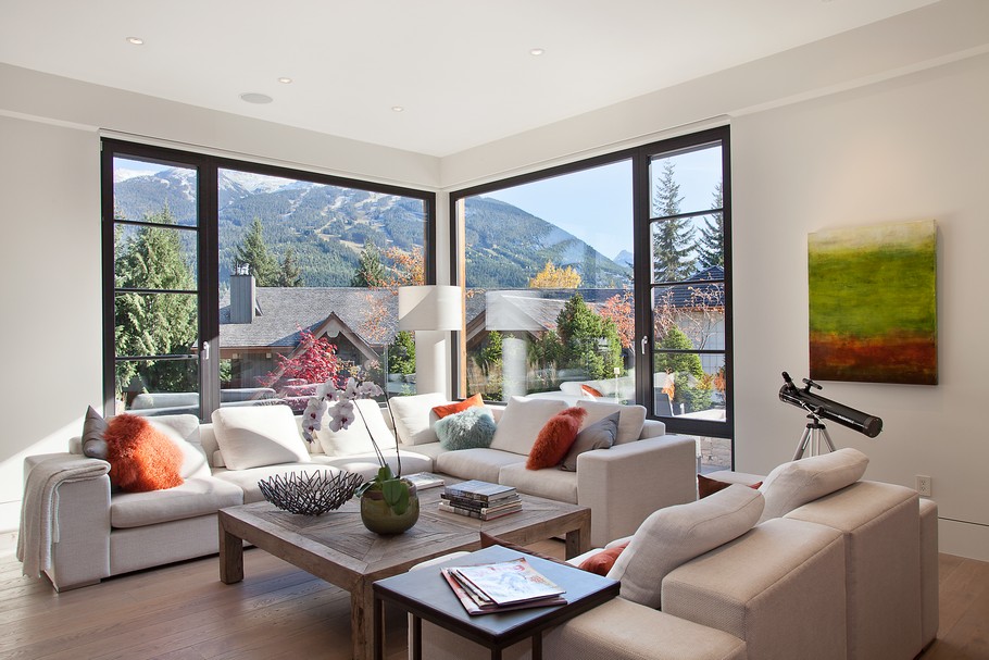Living Room with Long White Sofa and Low Wooden Table