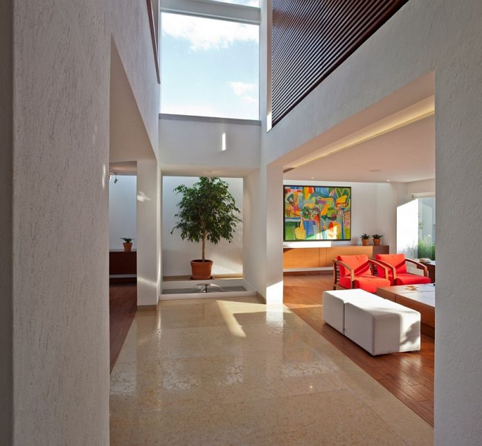 High Ceiling Effect for Attractive Mexican Home Design Living Space Wooden Flooring and Modern Sofa Furniture s