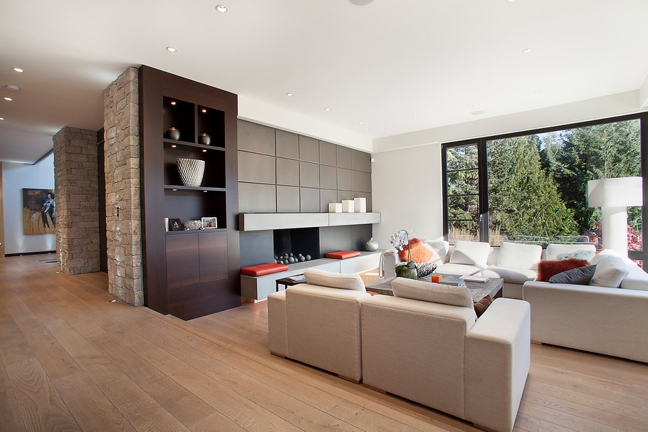 White Sofas and Wooden Shelves above the Wooden Cabinets in Chalet