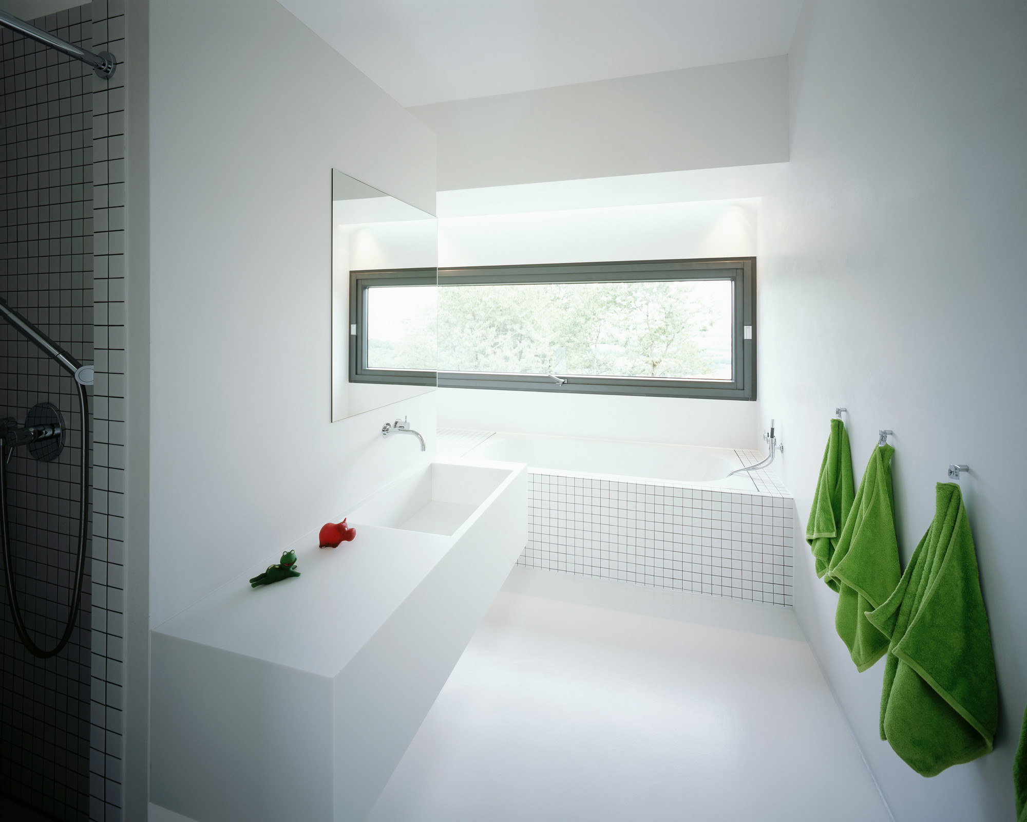 Bathroom Among White Bathtub Facing Green Towels Also Glass Finished House Anna Philipp Decor