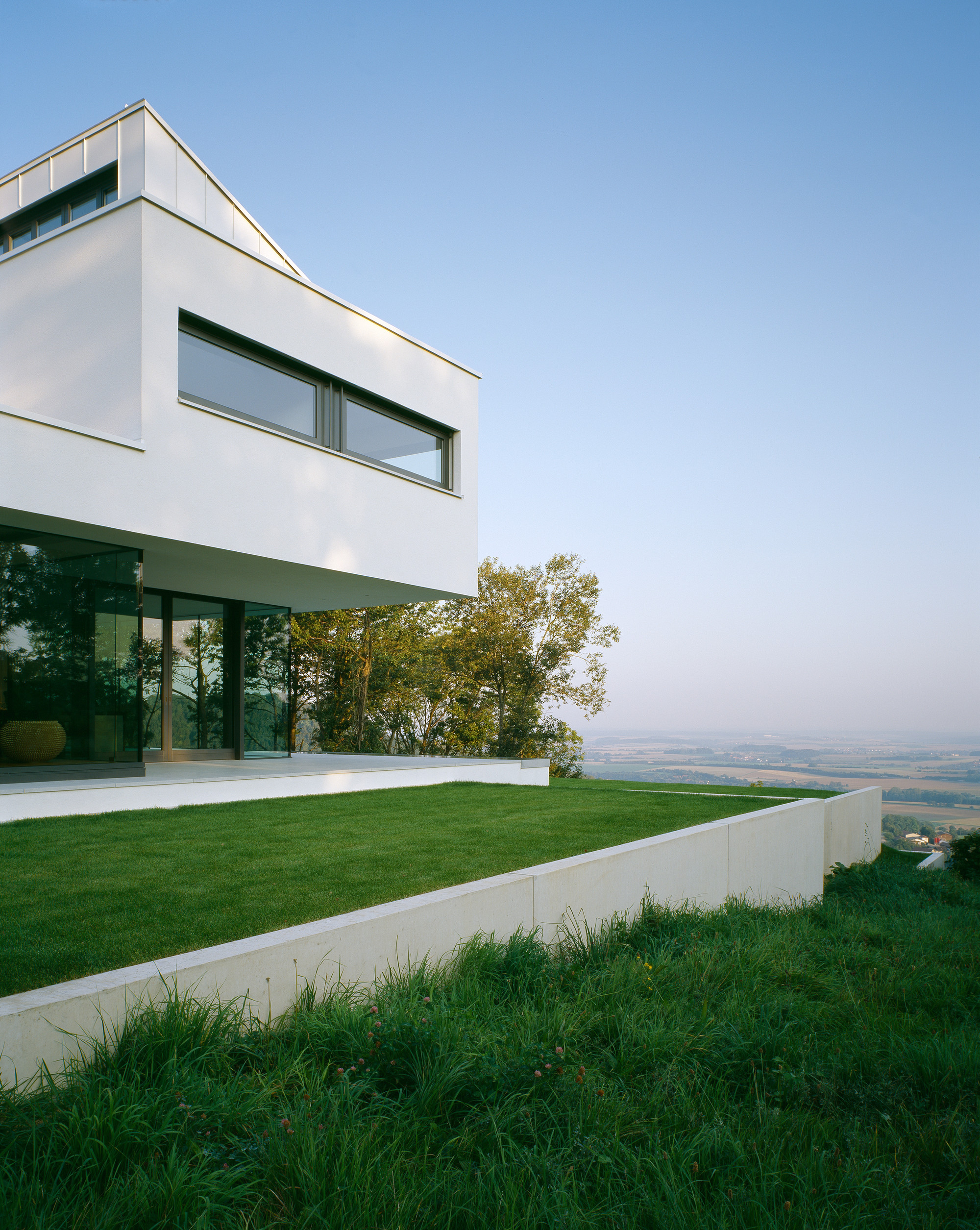 House Anna Philipp Design Ideas Showing Green Grass Also Glass Windows Framed Added Stylish Decor