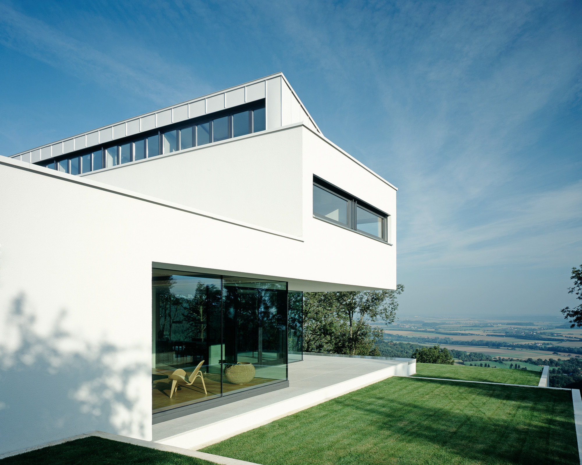 House Anna Philipp Design Ideas Showing Green Grass Also Glass Windows