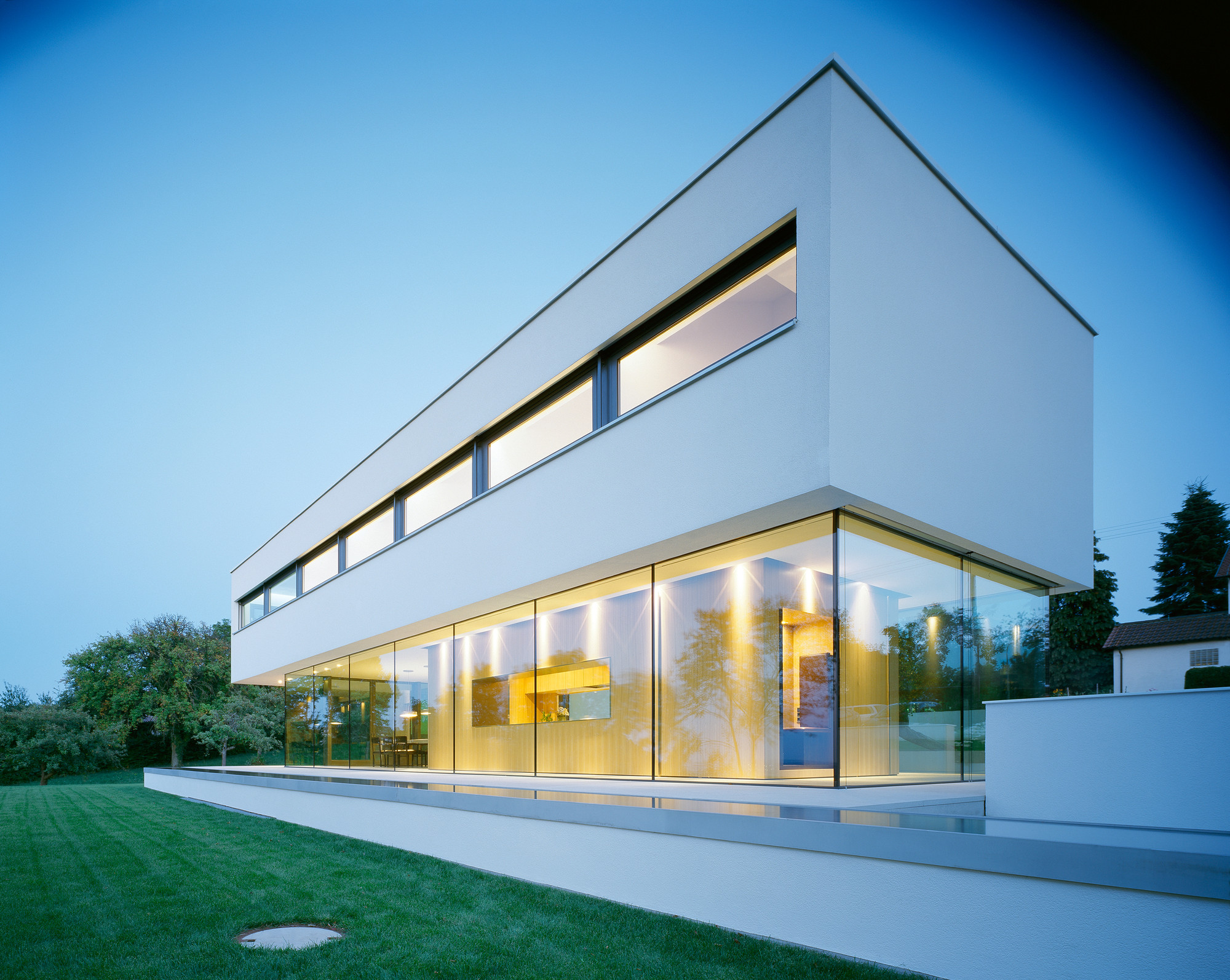 House Anna Philipp Exterior Area Showing Glass Windows Feat White Wall Framed Added Nice Decor