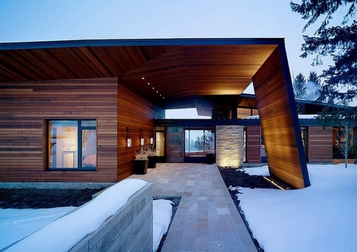 Modern Design from Carney Logan Burke Residence Among Tile Pathway Between White Snowy Environment At Winter