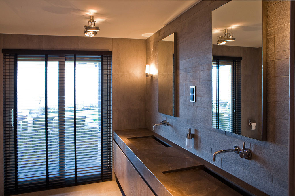 Small Wellness Villa Master Bathroom Interior Featured Near Sliding Glass Door Covered Aside Blind