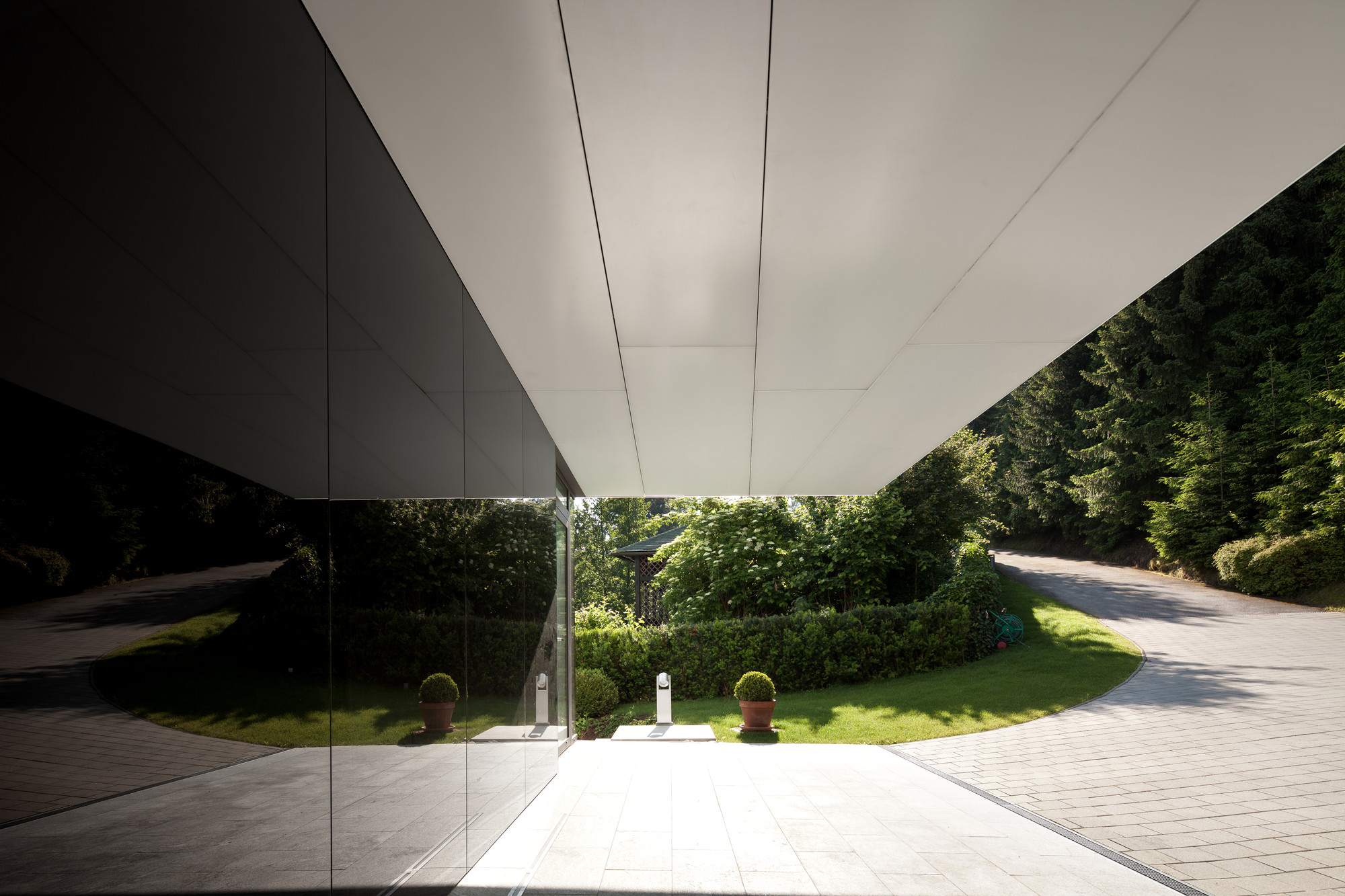 Alley Under Volume Near Glass Window Floor To Ceiling View Outside