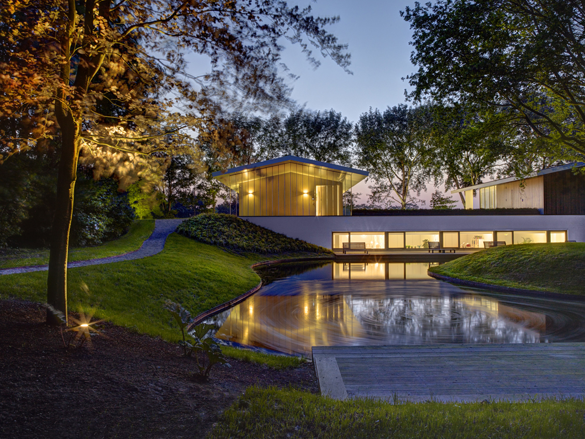 Architecture Wide Pond Which Is Filled Near Dark Colored Water
