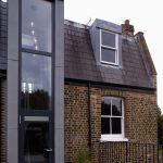 Combination Of Unpainted Brickwall Added Near Glass Windows On Wall Decoration