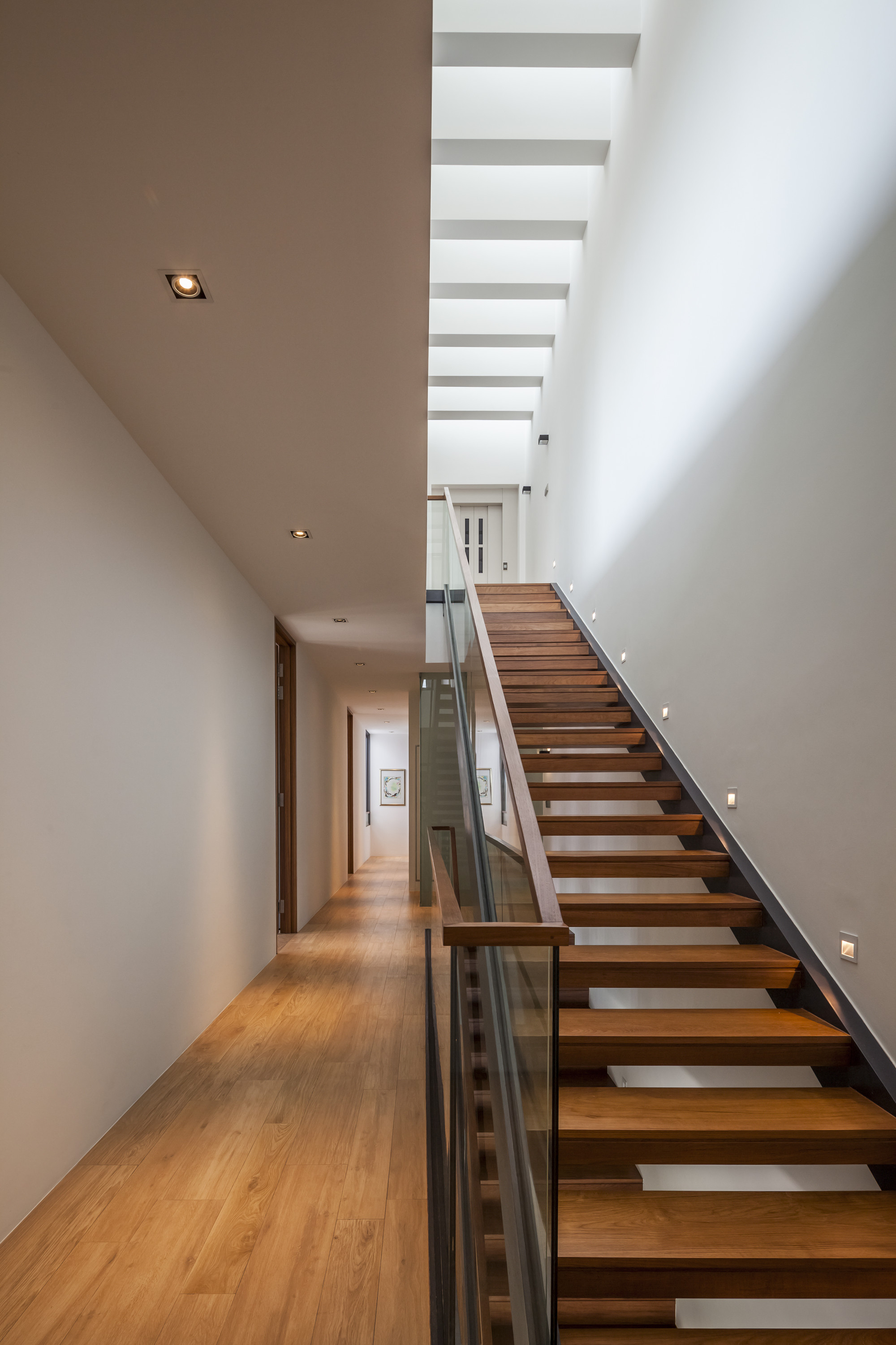Soft Brown Colored Wooden Floor Along With Comfy Brown Wooden Staircase