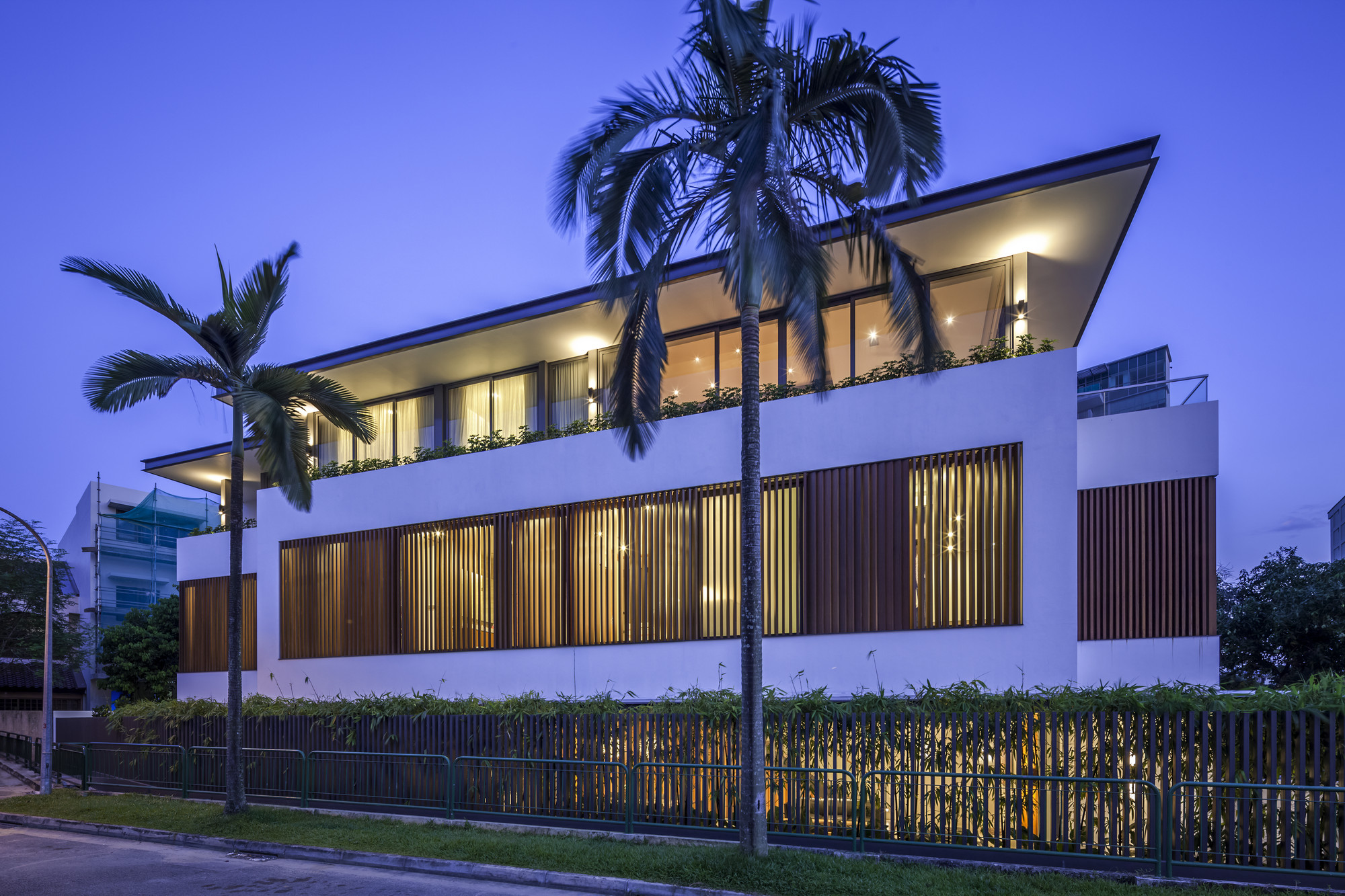 White Colored Outer Wlal Along With Dark Brown Outer Blind Windows