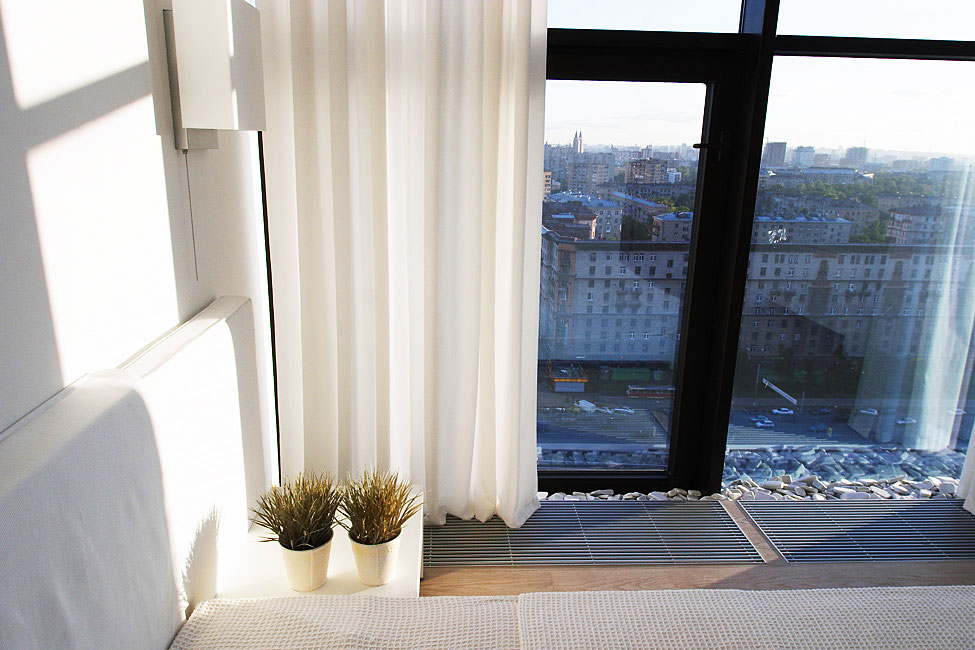 Exciting Details Of Bedroom At Falcons Nest Penthouse Near Two Indoor Planters On Side Table Also With Clear Curtain Exciting Details Of Bedroom At Falcons Nest Penthouse Near Two Indoor Planters On Side Table Also With Clear Curtain