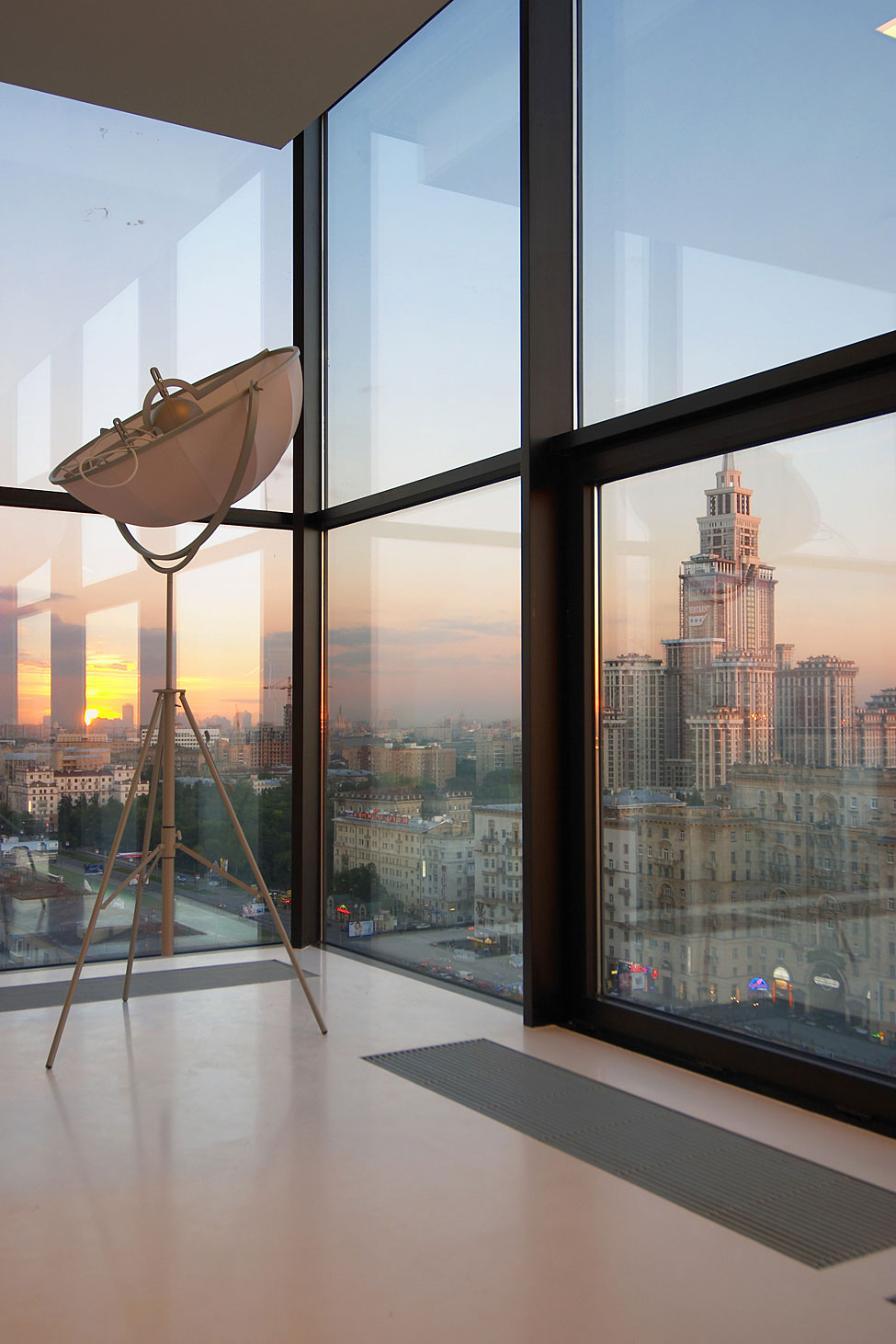 Modern Floor Lamp At Corner Of Living Room Nearby Window At Falcons Nest Penthouse Offers Stunning City View Modern Floor Lamp At Corner Of Living Room Nearby Window At Falcons Nest Penthouse Offers Stunning City View
