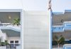 Nhabeo House – Indoor Tree as Interior Décor Idea in Townhouse Design White Lines Of Wall Made From Wooden Material